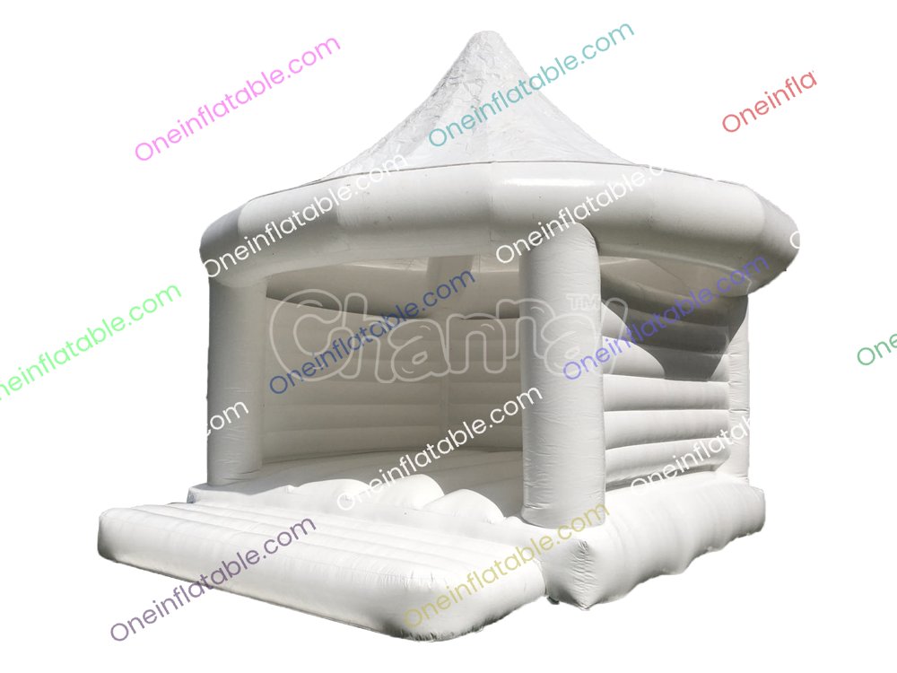 white wedding inflatable bounce house with tented roof